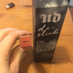 Bundle of conspiracy lip liner and setting spray